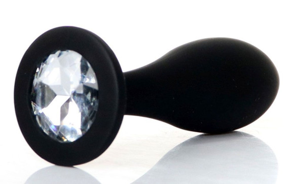 Черная анальная втулка с прозрачным кристаллом - 9,2 см. Черная анальная втулка с прозрачным кристаллом - 9,2 см.