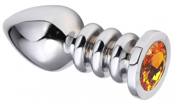 Серебристая анальная пробка на рельефной ножке с оранжевым кристаллом - 9 см. Серебристая анальная пробка на рельефной ножке с оранжевым кристаллом - 9 см.
