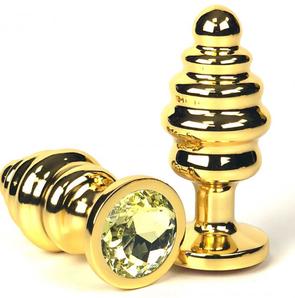 Золотистая ребристая анальная пробка с желтым кристаллом - 8,5 см. Золотистая ребристая анальная пробка с желтым кристаллом - 8,5 см.