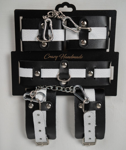Набор фиксаторов из черной и белой натуральной кожи Набор фиксаторов из черной и белой натуральной кожи
