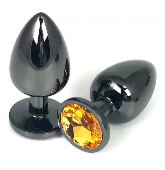 Черная металлическая анальная пробка с оранжевым стразом - 7,5 см. Черная металлическая анальная пробка с оранжевым стразом - 7,5 см.